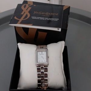 Vintage Yves Saint Laurent women's tank watch never worn Price firm